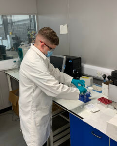 Lab technician performing analysis