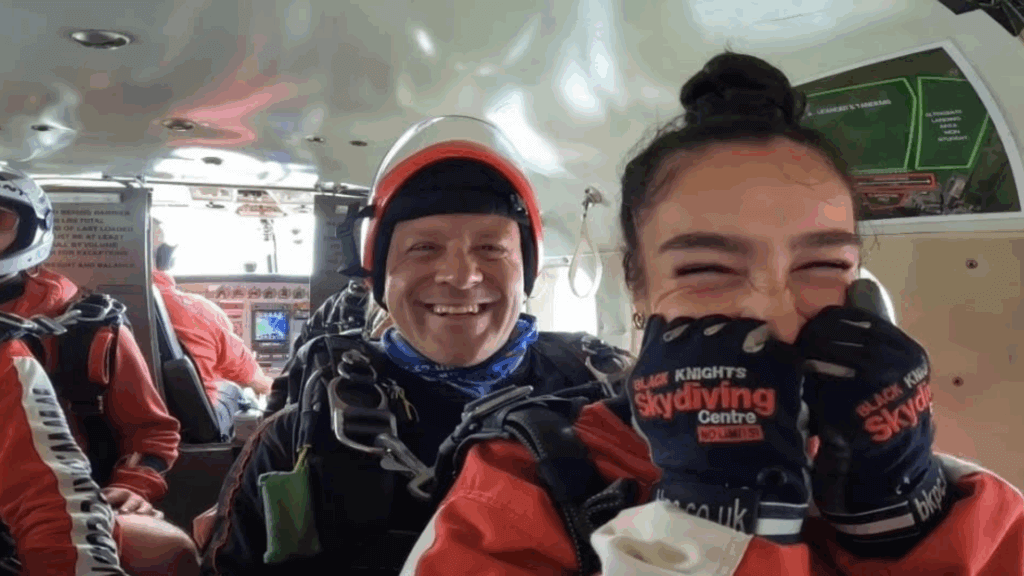 Erica Campbell and Kerryann Jones' Charity Jump. Displaying Community Impact at AHK